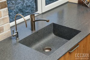 Corian® Midnight, solid surface with kitchen sink