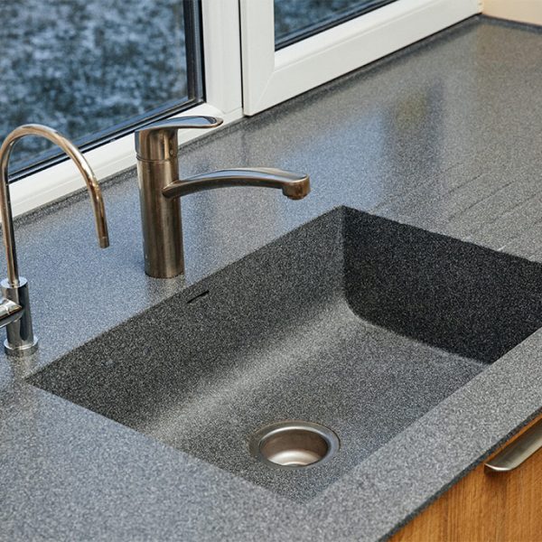 Corian® Midnight, solid surface with kitchen sink